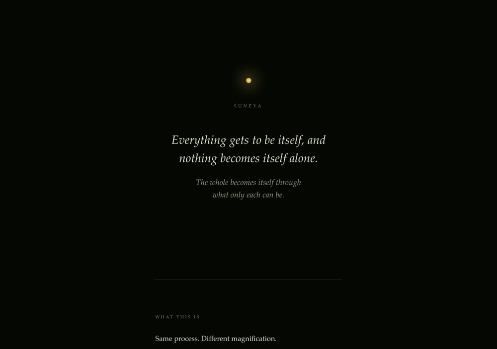 Suneya: a single small light on near black, with two lines of italic type beneath it